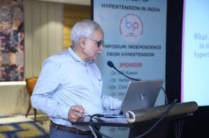 Dr CR Rawat giving talk and teaching doctors on Hypertension management in RSSHI symposium